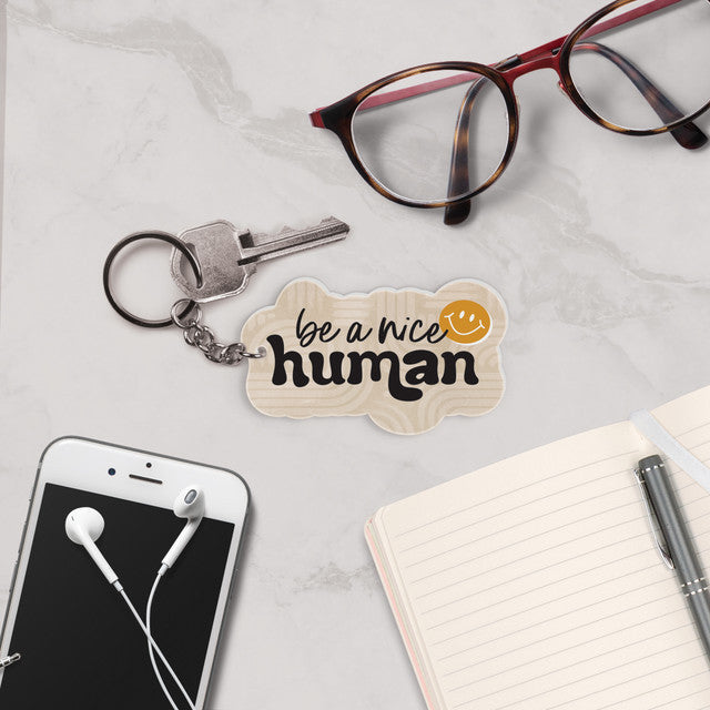 BE A NICE HUMAN KEYCHAIN
