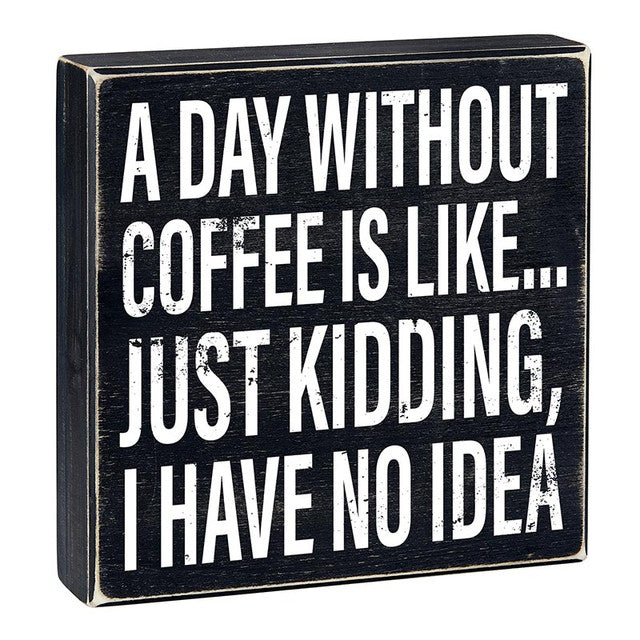 A DAY WITHOUT COFFEE BLOCK SIGN