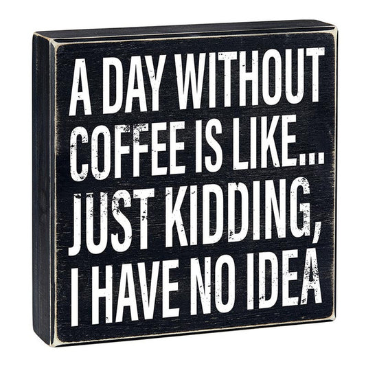 A DAY WITHOUT COFFEE BLOCK SIGN