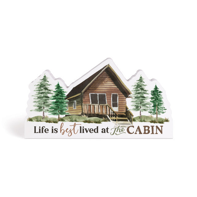 AT THE CABIN SHAPED SIGN