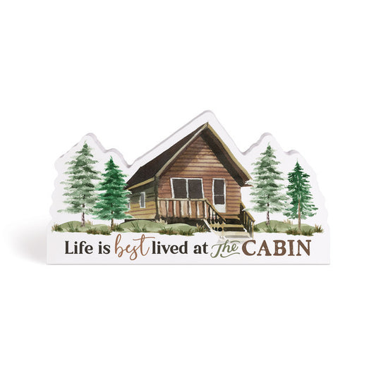 AT THE CABIN SHAPED SIGN