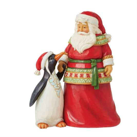 Santa With Penguin Figurine